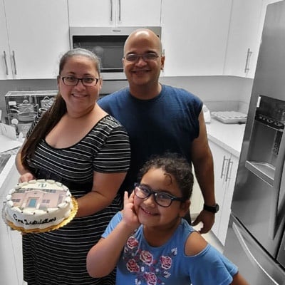 Keyla Velez Morales and her family in their new home.