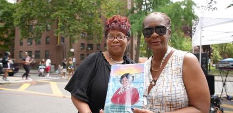 Theresa Davis and Monica Underwood hold up a photo of Dorothy Mae Richardson.