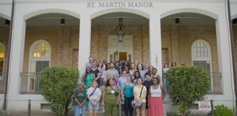 A tour group outside of St. Martin Manor.