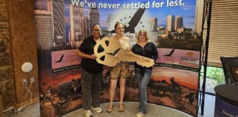 Jolene has a giant key, a symbol of her giant step toward stability.